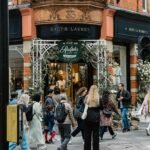 People walking past a Ralph Lauren store at Sloane Square in London.