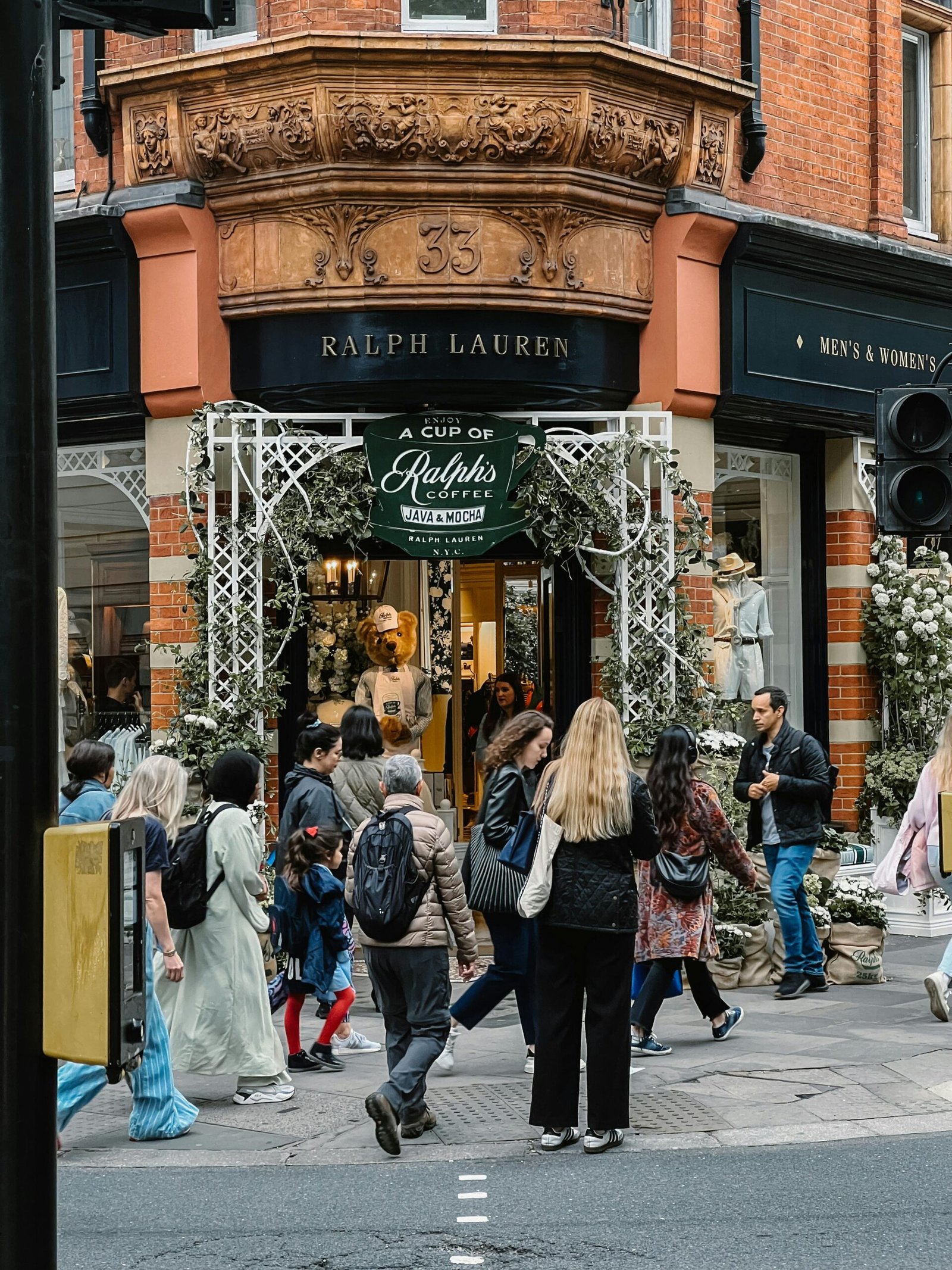 People walking past a Ralph Lauren store at Sloane Square in London.