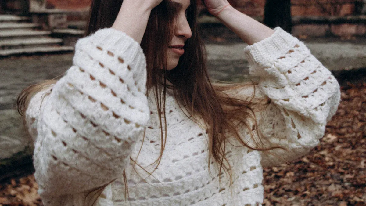 How do I design a pointelle sweater? Try these fresh looks for winter 2025