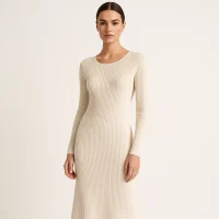 Female model wearing cotton knit dress, soft breathable factory design