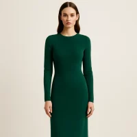 Elegant model in green knit dress, timeless knitwear design