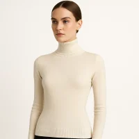 Elegant model wearing high neck knit top, knitwear manufacturer and wholesale supplier for global fashion retailers