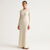 Model in long sleeve knit maxi dress, custom knitwear manufacturer and wholesale supplier for fashion companies